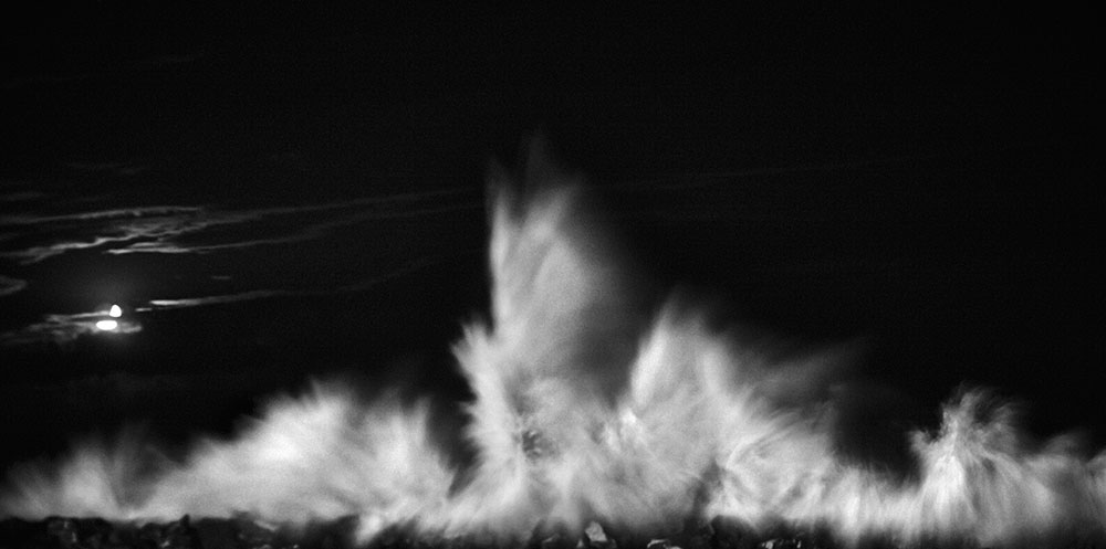 fine art abstract image of a wave crashing in Italy