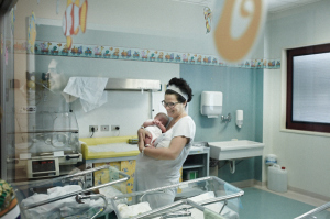 fine art and reportage photography of my sister at the hospital in the ocean town of Cecina