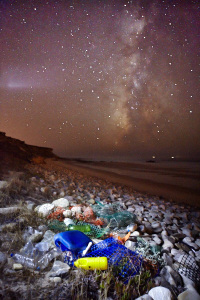 fine art and documentary photo of a beach along the atlantic ocean in portugal covered of plastic