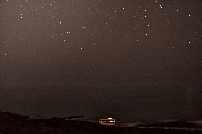 Fine art landscape photography of my van in front of the atlantic ocean in portugal