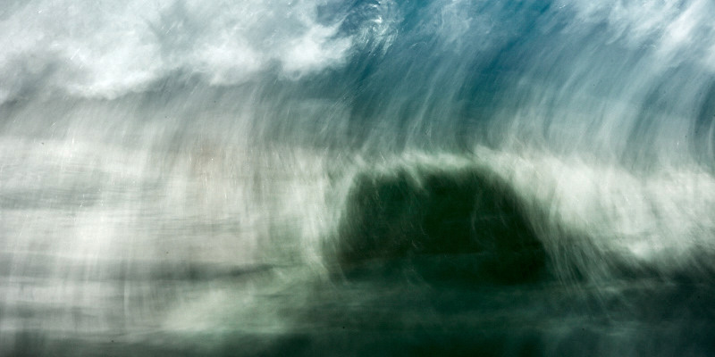 A fine art photograph of a wave in the atlantic ocean in Portugal done with a long shutter speed
