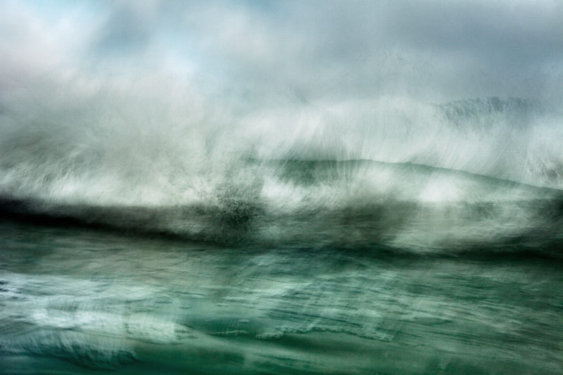abstract fine art color image of a seascape. photo taken in the ocean of a wave breaking in front of me