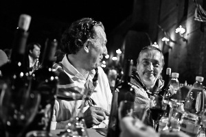 Fine art black and white photography of a dinner in Contrada della Pantera before the horse race , Palio di Siena 2014