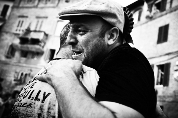 The barbaresco, the man in charge of the horse, crying after winning the 2014 Palio di Siena