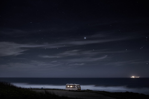 Fine art photography of a motorhome in front of the ocean in Portugal