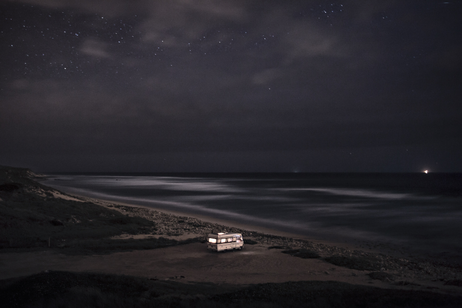 Fine art photography of a motorhome in front of the ocean in Portugal