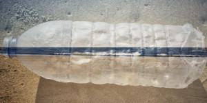 Fien art image of a plastic bottle wasted along a beach in Alentejo, Portugal