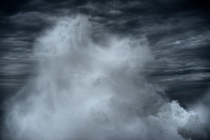 Abstract fine art image of a wave breaking on a rock on the Atlantic ocean