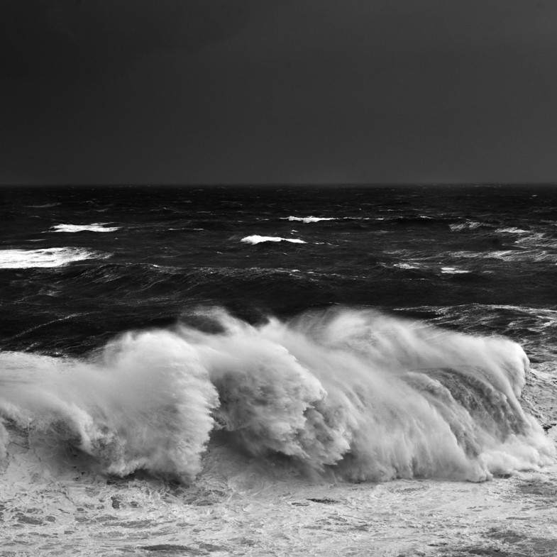 fine art black and white seascape of a big wave in Nazarè,  Portugal