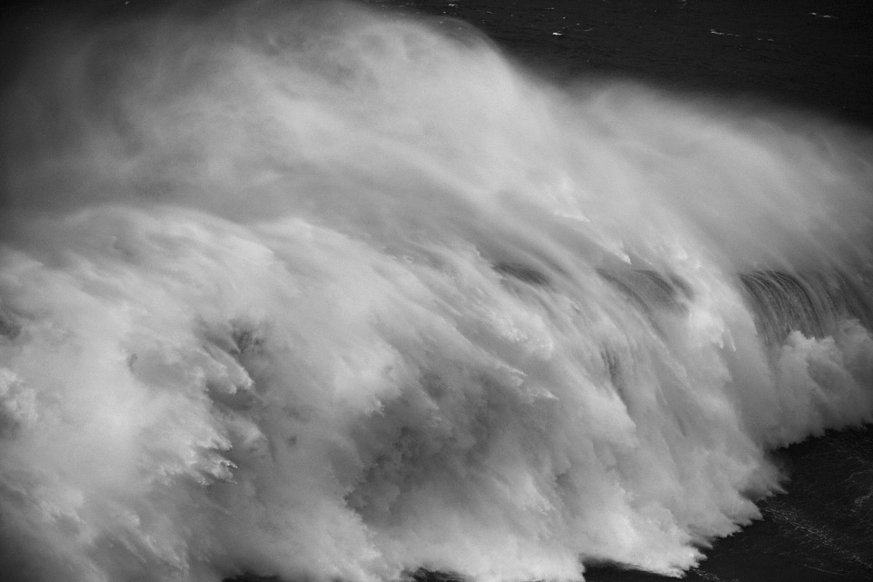 fino art black and white seascape of a huge wave in Nazaré