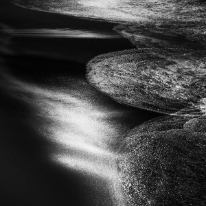 abstract fine art black and white photo of a shoreline along the atlantic coast in Portugal