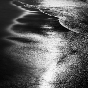fine art black and white abstract photo of the Atlantic ocean in south Portugal.