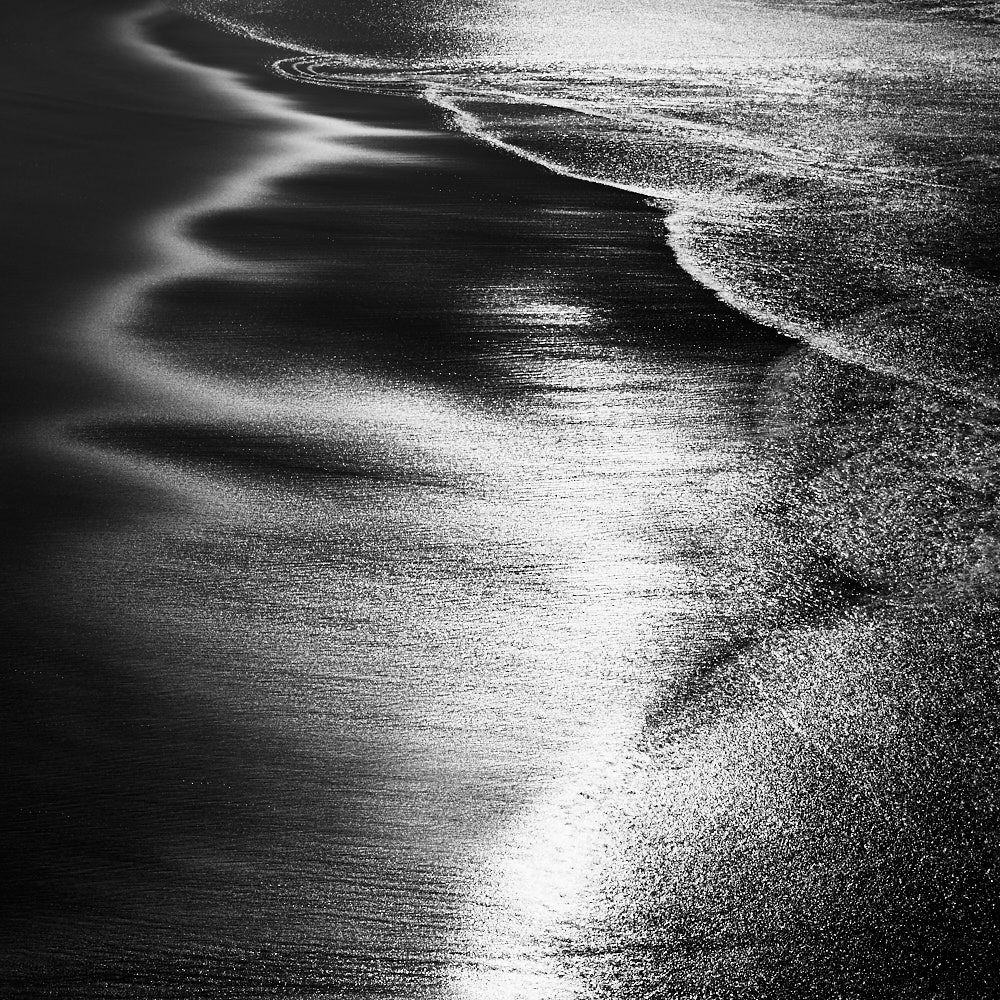 fine art black and white abstract photo of the Atlantic ocean in south Portugal. 